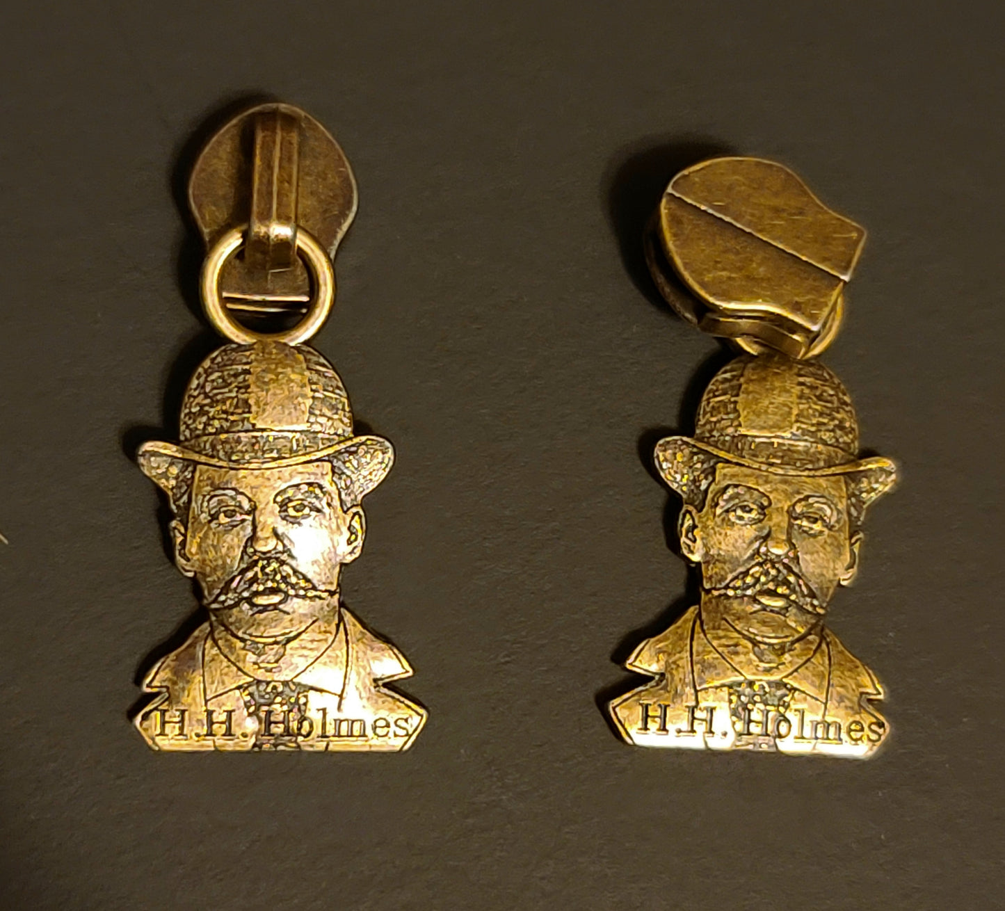 H.H. Holmes Zipper Pull